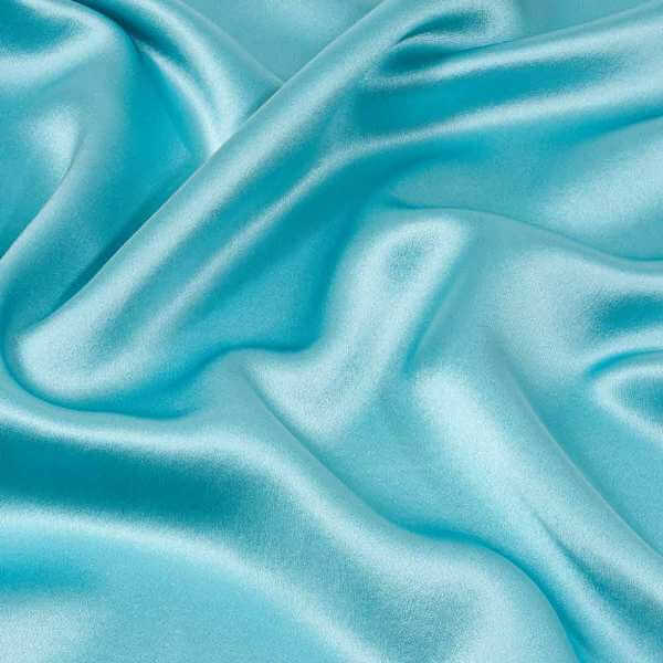 close up of aqua silk pillowcase